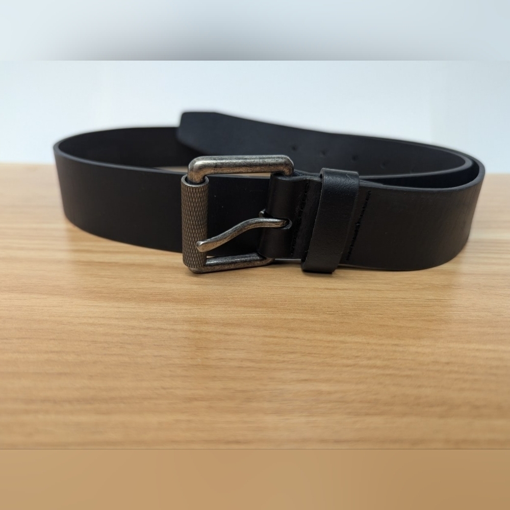 Black genuine leather belt in used condition